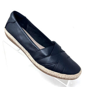 Clarks Black Flats with Woven Tan Sole